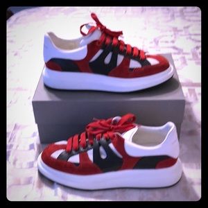 Alexander McQueen sneakers in size 13.